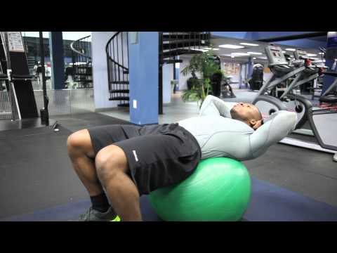 Exercise Ball Crunch with a Twist